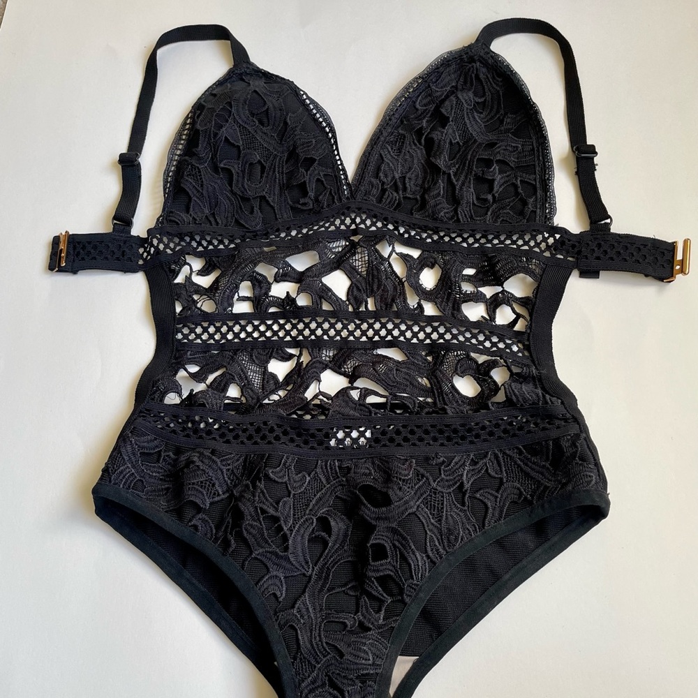 Misguided black one piece swimsuit.